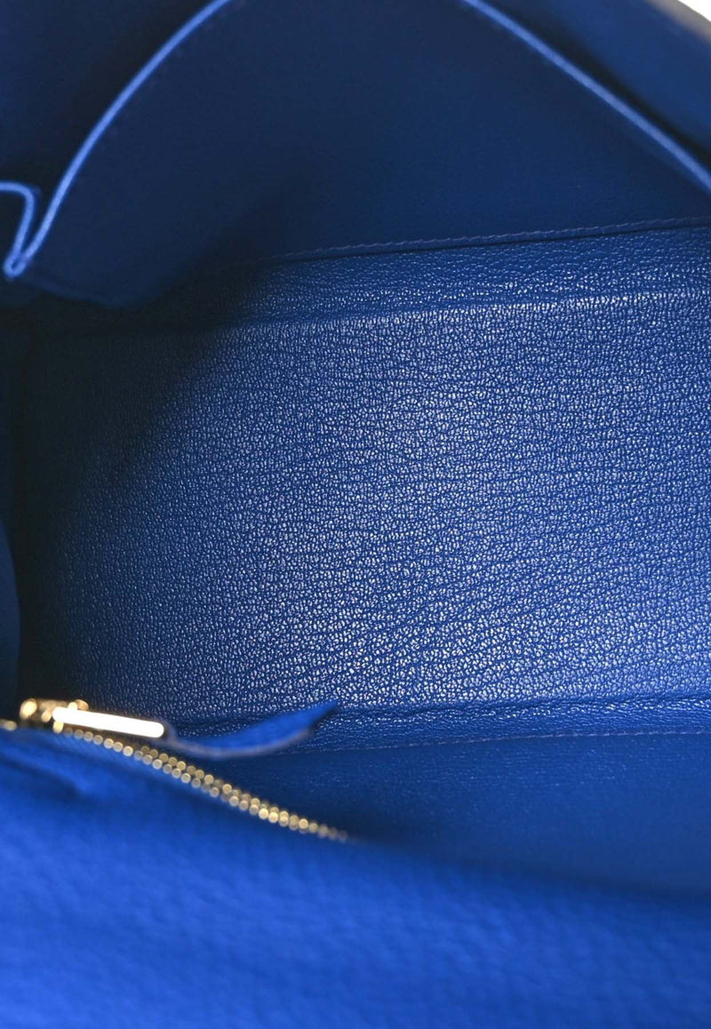 Kelly 25 Retourne in Bleu Royal Togo Leather with Gold Hardware