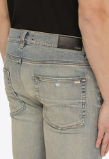 Washed-Out Distressed Skinny Jeans