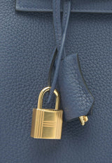 Kelly 25 Retourne in Bleu Navy Togo Leather with Gold Hardware