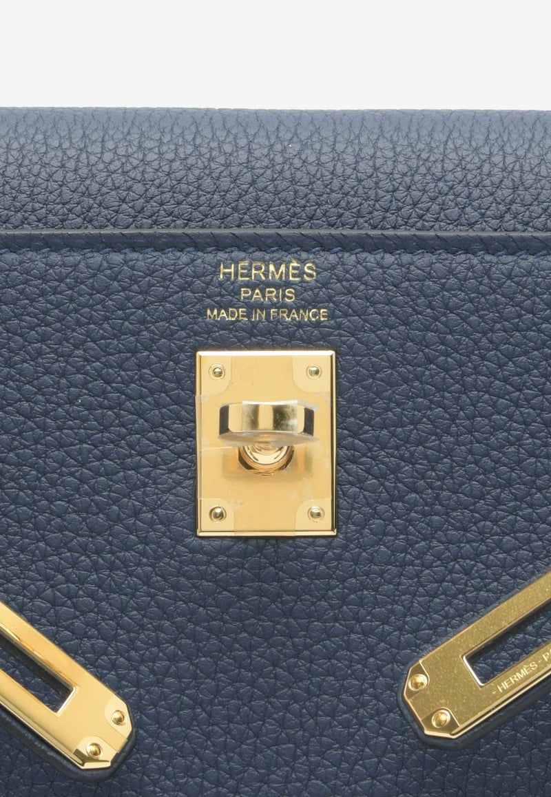 Kelly 25 Retourne in Bleu Navy Togo Leather with Gold Hardware